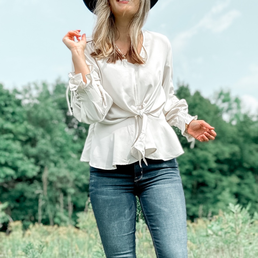 White blouse with sleeve tie details